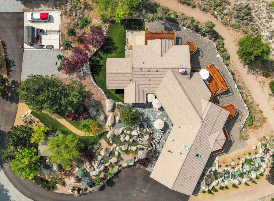 This stunning property boasts a luxurious home with a beautifully landscaped yard.