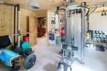 This home gym offers a dedicated space for fitness enthusiasts.