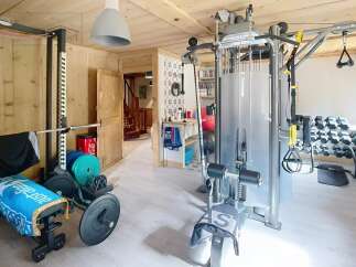 This home gym offers a dedicated space for fitness enthusiasts.