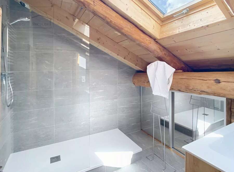 Experience luxury in this stunning bathroom featuring a modern shower and elegant design.