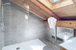Experience luxury in this stunning bathroom featuring a modern shower and elegant design.