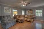 Step into this inviting living space, perfect for relaxation and entertaining.
