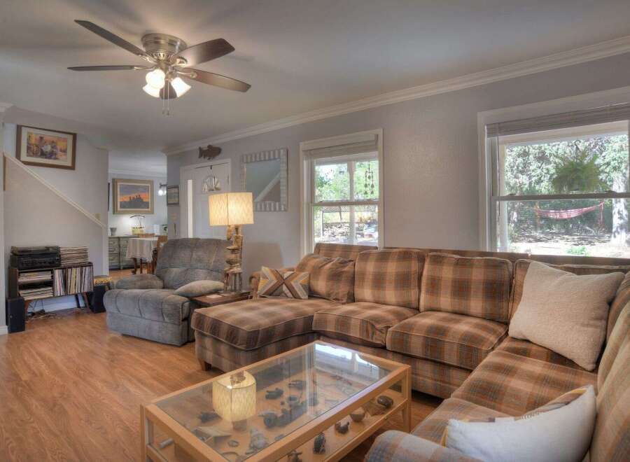 Step into this inviting living space, perfect for relaxation and entertaining.