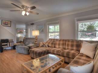 Step into this inviting living space, perfect for relaxation and entertaining.