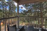 Enjoy the tranquility of nature from this charming porch.