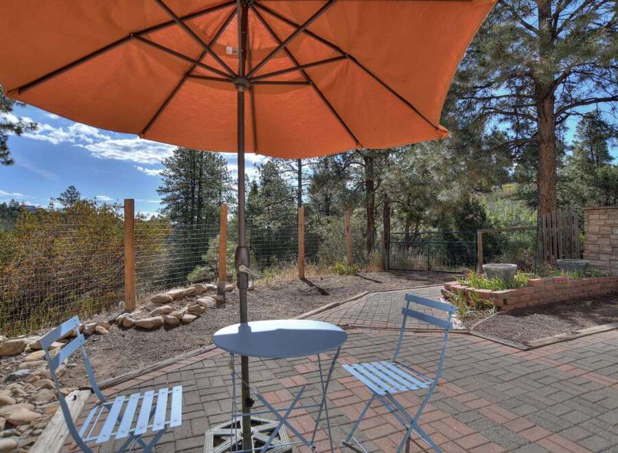 Enjoy the tranquility of this outdoor patio, perfect for relaxation and entertaining.