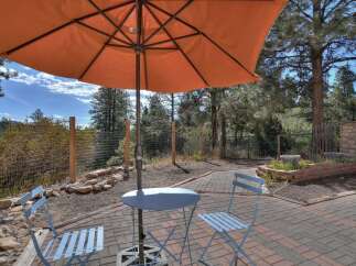Enjoy the tranquility of this outdoor patio, perfect for relaxation and entertaining.