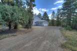 Nestled in a serene, wooded setting, this property offers a tranquil escape.