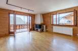 This stunning property boasts a warm and inviting interior with beautiful wooden accents throughout.