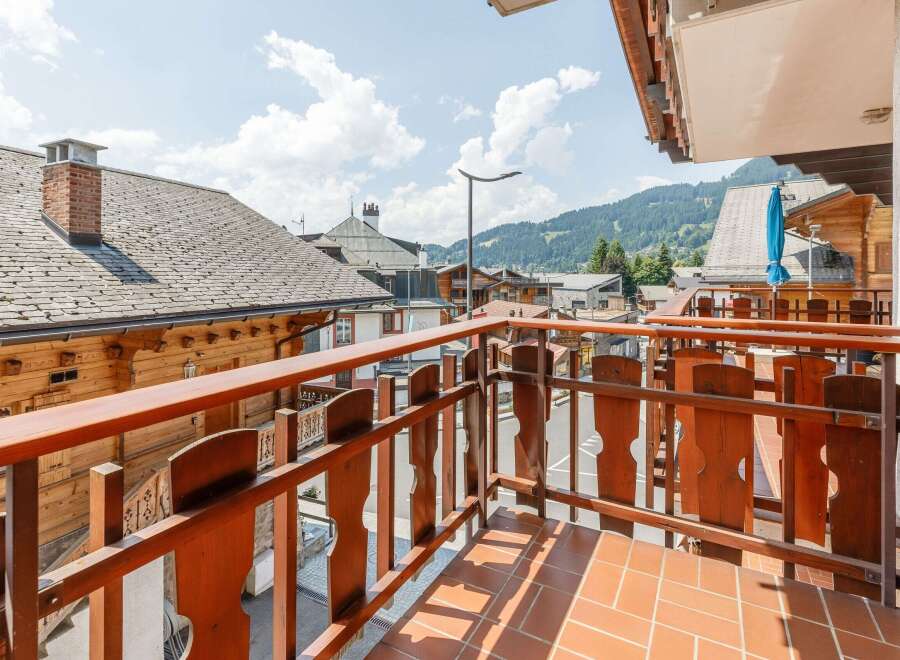Enjoy breathtaking views from this charming balcony.