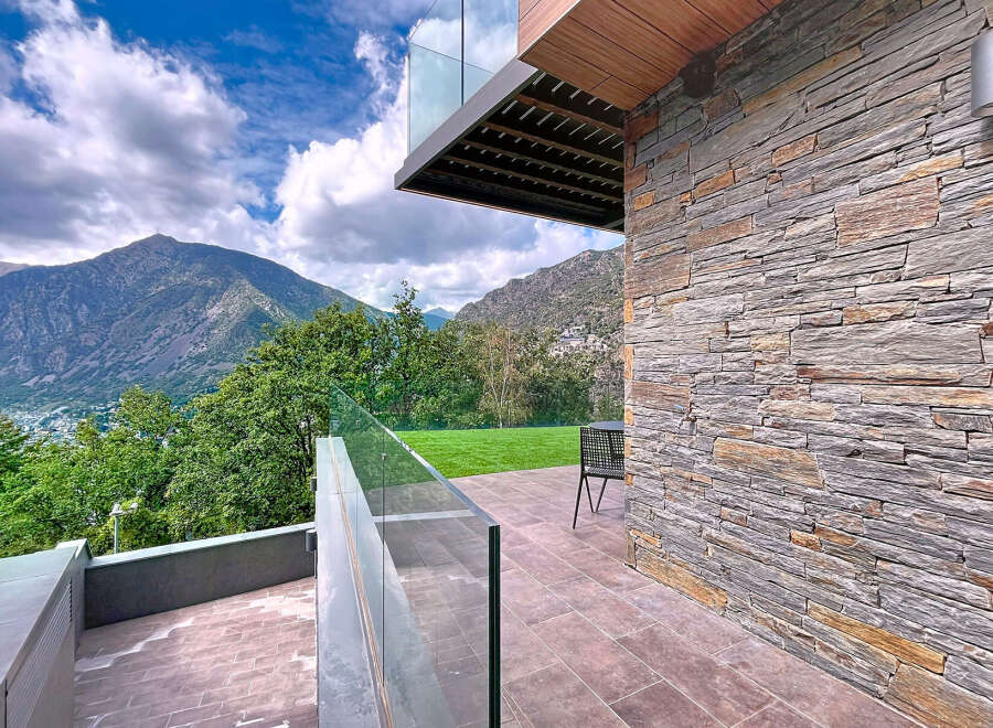 Experience luxury living with this stunning property featuring a modern design and breathtaking mountain views.
