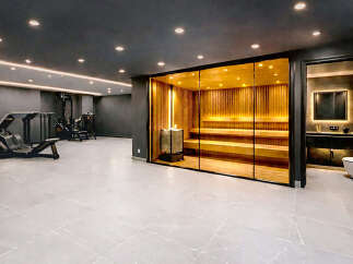 Step into luxury with this stunning property featuring a private sauna and a fully equipped gym.