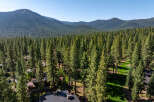 Nestled amidst a lush forest, this property offers unparalleled privacy and tranquility.