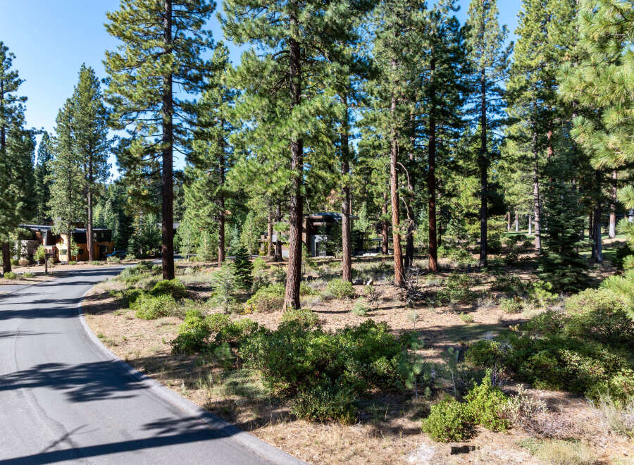 Nestled amidst a serene forest setting, this property offers a tranquil escape.