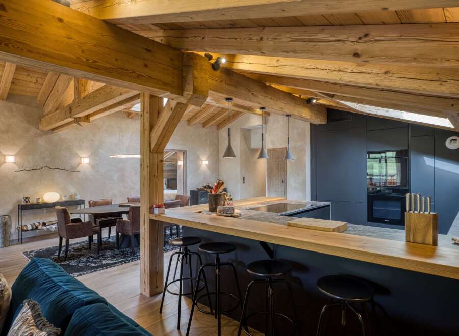 This stunning property boasts a rustic yet modern kitchen, perfect for culinary enthusiasts.
