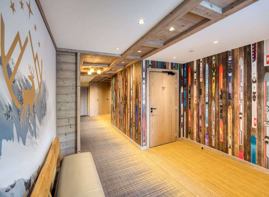 Step into a world of alpine charm with this stunning hallway design.