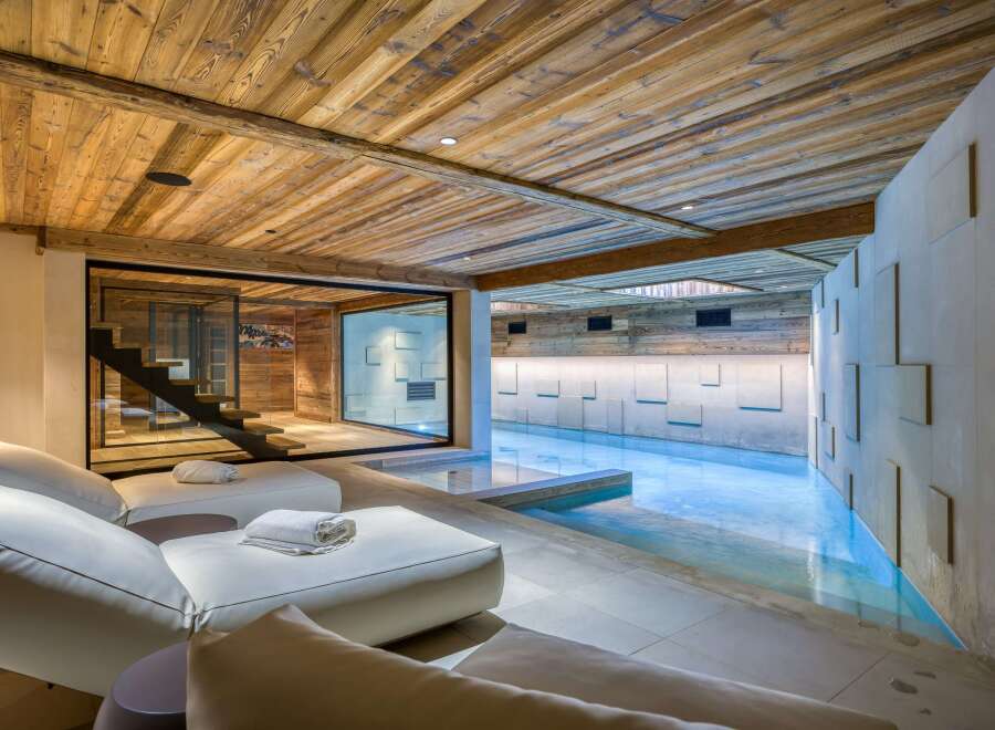 Experience luxury and relaxation in this stunning indoor pool area.