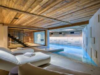 Experience luxury and relaxation in this stunning indoor pool area.
