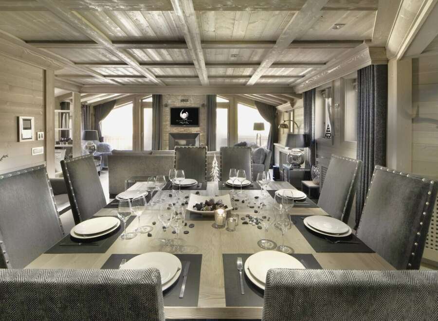 Experience luxury living in this stunning property, featuring a beautifully designed dining area.