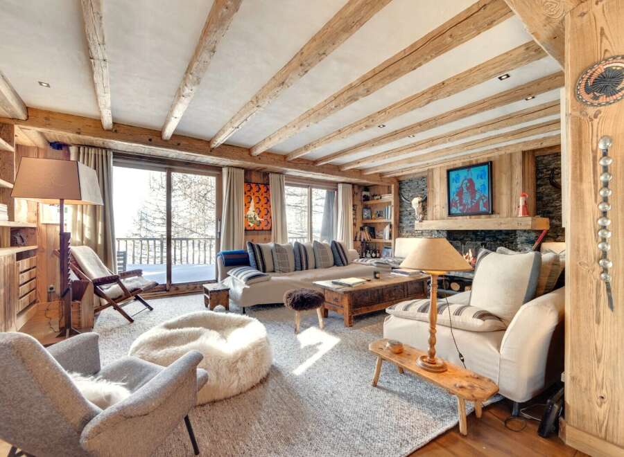 Experience the epitome of rustic luxury in this stunning living room.