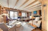 Experience the epitome of rustic luxury in this stunning living room.