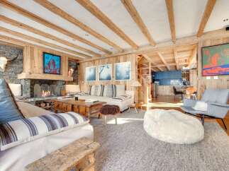 Experience rustic luxury in this stunning living room.