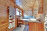 This stunning bathroom boasts a warm and inviting ambiance with its natural wood paneling.