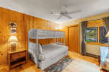 This cozy bedroom features a charming bunk bed, perfect for accommodating guests or family members.