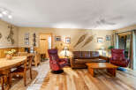 Step into this inviting living space, perfect for relaxation and entertaining.