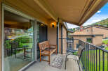 Enjoy the serene views from this charming balcony.