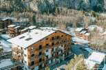 Discover a stunning alpine property nestled in a picturesque mountain setting.