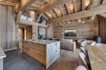 Experience rustic elegance in this stunning chalet-style home.