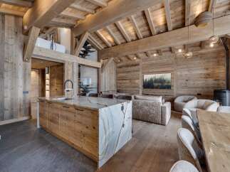Experience rustic elegance in this stunning chalet-style home.