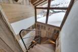This stunning property boasts a beautifully crafted wooden staircase, creating a warm and inviting atmosphere.