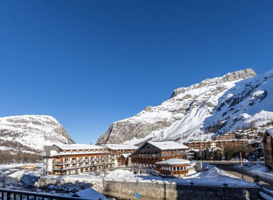 Experience the charm of this stunning mountain property, nestled in a picturesque winter wonderland.