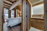 Step into a cozy retreat with this stunning property, featuring exquisite wooden accents throughout.