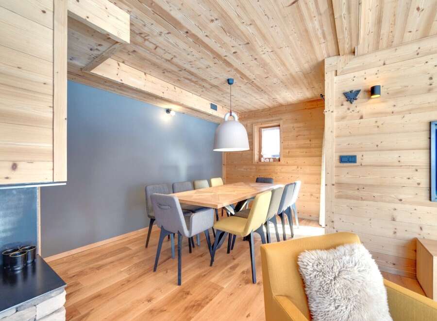 This stunning property boasts a warm and inviting dining area, perfect for hosting gatherings.