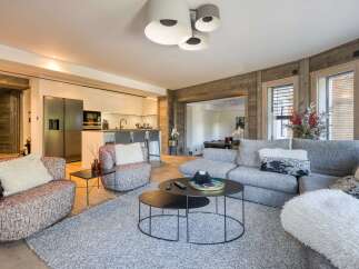 Step into luxury with this stunning property, featuring a modern open-plan living space.