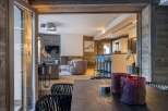 Experience luxury living in this stunning chalet, featuring a seamless blend of modern design and rustic charm.