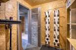 Step into this inviting space, perfect for organizing your gear.