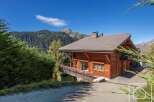 Discover a stunning wooden chalet nestled in the heart of the mountains.