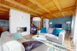 Experience luxury living in this stunning property, featuring a cozy fireplace and a modern, open-plan design.