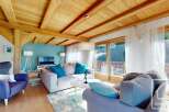 Experience the charm of this stunning property, featuring a beautifully designed living room with a cozy ambiance.