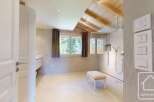 This luxurious bathroom boasts a modern design with a touch of rustic charm.