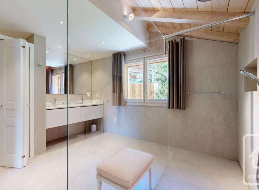 Step into luxury with this stunning bathroom featuring a sleek, modern design.