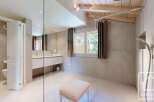 Step into luxury with this stunning bathroom featuring a sleek, modern design.