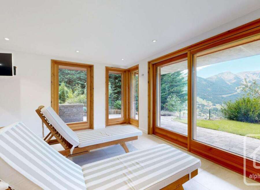 Relax and unwind in this stunning property, featuring a bright and airy interior with breathtaking mountain views.