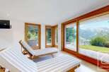 Relax and unwind in this stunning property, featuring a bright and airy interior with breathtaking mountain views.
