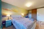 Experience tranquility in this beautifully designed bedroom.