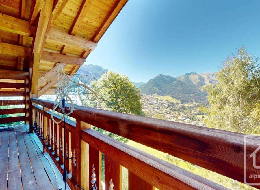 Enjoy breathtaking mountain views from this stunning balcony.